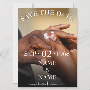 Hands of a colored wedding couple pin on ring