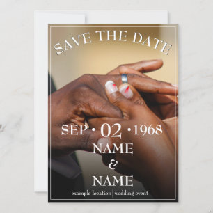 Hands of a colored wedding couple pin on ring