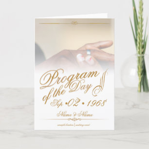 Hands of a colored wedding couple pin on ring gold announcement