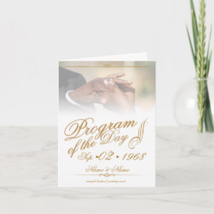 Hands of a colored wedding couple pin on ring gold card