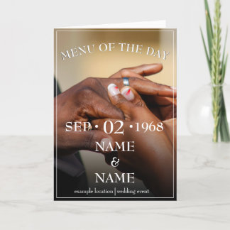 Hands of a colored wedding couple pin on ring thank you card