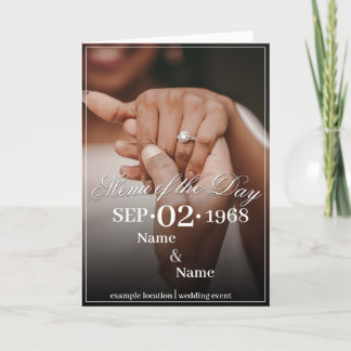 Hands of a Colored Wedding Couple with Ring Announcement