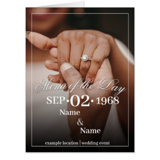 Hands of a Colored Wedding Couple with Ring Card