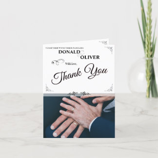 Hands of a Gay Wedding Couple with Rings Announcement
