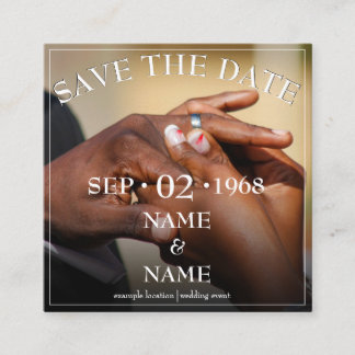 Hands of a wedding couple with ring enclosure card