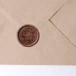 Handwriting Merry Christmas Family Name & Heart Wax Seal Sticker<br><div class="desc">A minimalist design featuring "Merry Christmas" in chic handwriting and below it, your family name and a cute heart. Save yourself the time and guesswork of working with wax by opting for peel-and-stick wax seal stickers instead. Order a set of customized wax seals instead of melting, pouring, and stamping each...</div>
