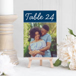 Handwritten Navy Blue Wedding Photo Table Number<br><div class="desc">Wedding table number cards feature an an engagement photo of the bride and groom. White casual handwritten style text with navy blue background color - note, colors can be modified. To order: type in the table number, click "change" by the default photo to upload your own photo, and add that...</div>