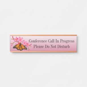 Hanging Name Plate Conference Call In Progress