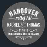 Hangover Relief Kit | Chalkboard Wedding Favor Classic Round Sticker<br><div class="desc">Treat your guests to some recovery essentials (pain reliever, water, snacks) and seal up your care packages with these cute stickers. Design features "Hangover Relief Kit -- In Sickness and in Health" in white vintage apothecary style text on a brushed grey chalkboard background. Personalize with your names and wedding date;...</div>