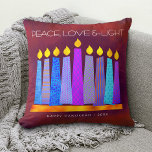 Hanukkah Bold Blue Candles on Red Peace Love Light Throw Pillow<br><div class="desc">“Peace, love & light.” A playful, modern, artsy illustration of boho pattern candles in a menorah helps you usher in the holiday of Hanukkah. Assorted blue candles with colorful faux foil patterns overlay a rich, deep burnt red orange textured background. Faux copper pattern foil on a brick red background for...</div>