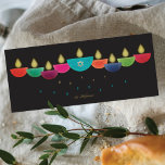 Hanukkah Card | Colorful Oil Lamp Menorah | Black<br><div class="desc">Celebrate Hanukkah with a vibrant and contemporary greeting card design. This menorah is formed from colorful bowl-shaped oil lamps, each with a glowing flame, arranged in a cheerful display. The center lamp highlights a faux-foil Star of David, adding both meaning and elegance. Perfect for families who enjoy modern and artistic...</div>