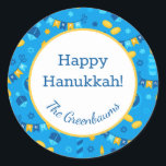 Hanukkah Dreidels Gift Tag<br><div class="desc">These fabulous gift tags would look great on all your Hanukkah gifts.  They are so festive with their menorahs,  gelt,  Hanukkah candles and banners and Stars of David in blue and yellow.  Trendy yet traditional.  And,  they are customizable with your family name.</div>
