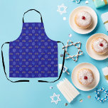 Hanukkah Gold Dreidel Star of David Menorah Blue Apron<br><div class="desc">Get ready to cook up some Hanukkah magic in style with our festive Hanukkah apron! This apron features a delightful design of gold Dreidels, Star of David, and Menorah on a beautiful blue background, making it the perfect accessory for your holiday celebrations. Whether you're frying up latkes or preparing a...</div>