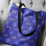 Hanukkah Gold Dreidel Star of David Menorah Blue Tote Bag<br><div class="desc">Elevate your Hanukkah style with our fabulous tote bag featuring gold Dreidels, Stars of David, and Menorahs on a vibrant blue background. This tote is the perfect blend of festive and functional – it's spacious enough to carry all your holiday essentials and adds a pop of Hanukkah cheer to any...</div>