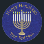 Hanukkah Gold Menorah On Rich Blue Background Classic Round Sticker<br><div class="desc">A classic Hanukiah design in gold and white on a deep blue faux sparkle background features space for your personalized text making this round sticker a unique addition to your Hanukkah celebrations. Use these Hanukkah stickers on mailings, scatter on a gift package or tuck them into favor bags as party...</div>