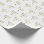 Hanukkah Gold Menorah on White Pattern Wrapping Paper<br><div class="desc">Wrap your gifts in style this elegant holiday season with our elegant Hanukkah gift wrap. This simple design features a white background with faux gold menorah repeated into a pattern. Designed by artist Susan Coffey.</div>