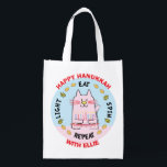 Hanukkah Happy Cat, Light, Eat, Spin Grocery Bag<br><div class="desc">Hanukkah Happy Cat, Light, Eat, Spin, white 2-sided bag. All design elements can be edited. All editable text can be deleted and replaced with your own message. Use your favorite font color, size, and style. Happy Hanukkah/Chanukah! Style: Reusable Bag Go green and save the planet with our reusable grocery bag!...</div>