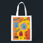 Hanukkah Happy Dancing Colorful Dreidels Grocery Bag<br><div class="desc">Hanukkah Happy Dancing Colorful Dreidels white 2-sided bag. All design elements can be edited. All editable text can be deleted and replaced with your own message. Use your favorite font color, size, and style. Happy Hanukkah/Chanukah! Style: Reusable Bag Go green and save the planet with our reusable grocery bag! Made...</div>