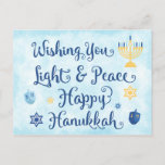 Hanukkah Light and Peace Holiday Postcard<br><div class="desc">A Jewish Hanukkah theme card with a menorah, Star of David and Driedel. The text reads Wishing You Light & Peace Happy Hanukkah. The background is a light blue watercolor wash. Personalize the back with your own message and/or company logo. These postcards are an economical way to send your holiday...</div>
