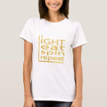 Hanukkah "LIGHT EAT SPIN REPEAT" Basic T-Shirt<br><div class="desc">Hanukkah "LIGHT EAT SPIN REPEAT" Gold Basic T-Shirt Choose from over 155 shirt styles and sizes for this design. Thanks for stopping and shopping by! Much appreciated! Happy Chanukah/Hanukkah!!! Style: Women's Basic T-Shirt This basic t-shirt features a relaxed fit for the female shape. Made from 100% cotton, this t-shirt is...</div>