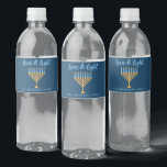 Hanukkah Love & Light Custom Blue Menorah Party Water Bottle Label<br><div class="desc">Cute custom Love and Light Hanukkah party water bottle labels for a Jewish family Chanukah dinner celebration with a synagogue. Personalize this pretty accessory with your own last name or group information in blue under the pretty gold menorah.</div>