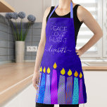 Hanukkah Menorah Candles on Blue Peace Love Light Apron<br><div class="desc">“Peace, love & light.” Here’s a wonderful way add to the fun of your holiday baking. Add extra sparkle to your holiday culinary adventures whenever you wear this stunning, colorful, custom name Hanukkah apron. A playful, artsy illustration of blue menorah candles with colorful faux foil patterns and modern typography overlay...</div>