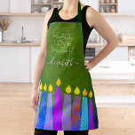 Hanukkah Menorah Candles on Green Peace Love Light Apron<br><div class="desc">“Peace, love & light.” Here’s a wonderful way add to the fun of your holiday baking. Add extra sparkle to your holiday culinary adventures whenever you wear this stunning, colorful, custom name Hanukkah apron. A playful, artsy illustration of blue menorah candles with colorful faux foil patterns and modern typography overlay...</div>