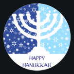 Hanukkah Menorah Sticker<br><div class="desc">A white graphic Hanukkah menorah sits against a wintry blue background on this sticker. Two tones of blue add contrast to the snowflakes and stars of the background. Add your own customized Hanukkah message underneath and start sticking this label on everything! Available in matching postage, cards and other favors.</div>