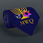 HANUKKAH Monogram Neck Tie<br><div class="desc">Elegant,  stylish midnight blue HANUKKAH Neck Tie,  designed with faux gold menorah,  colorful Star of David and silver colored dreidel plus CUSTOMIZABLE MONOGRAM. There is a subtle tiled pattern of the Star of David in the background. Available in mid blue with optional monogram.</div>
