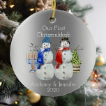 Hanukkah Snowman Christmas Our First Chrismukkah 2 Ceramic Ornament<br><div class="desc">This design was created though digital art. It may be personalized in the area provided or customizing by changing the photo or added your own words. Contact me at colorflowcreations@gmail.com if you with to have this design on another product. Purchase my original abstract acrylic painting for sale at www.etsy.com/shop/colorflowart. See...</div>