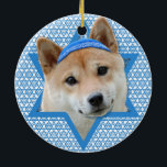 Hanukkah Star of David - Shiba Inu Ceramic Ornament<br><div class="desc">What could make saying Happy Hanukkah more fun than having this Shiba Inu Dog wearing a Yamaka surrounded by the Star of David. This whimsical holiday design will be sure to delight your friends and family as well as other animal lovers. This design is available in over 100 Dog Breeds....</div>