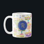 Hanukkah White Gold Menorah Star of David Monogram Coffee Mug<br><div class="desc">This custom holiday coffee mug features a chic pattern of gold,  green and purple menorah and gold Star of David on a white background. On either side is a blue circle boarded in gold for your monogram initial to personalize. Drink in style! Designed by world renowned artist ©Tim Coffey.</div>