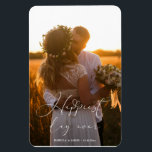Happiest Day Ever Elegant Calligraphy Wedding  Magnet<br><div class="desc">An exquisite wedding photo magnet featuring your beautiful wedding photographs. An elegant white calligraphy overlay 'happiest day ever', embellished with decorative heart flourishes, graces the image with personalized text of the couple's name and wedding date creating a timeless and intimate feel. The text is delicately placed across the photo, and...</div>