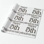 Happy 5th Anniversary Wrapping Paper<br><div class="desc">This wrapping paper feature the words "Happy 5th Anniversary" in a unique print font with gold letters black outline. All wrapping papers are offered in four types of premium paper and five different sizes. Has a softer surface and dull finish with full color edge to edge printing on 60lb, text...</div>