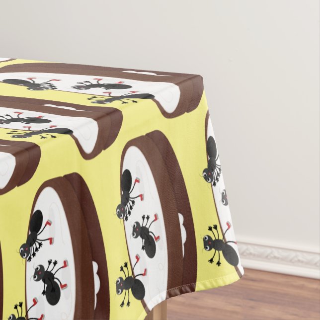 Happy ants ice skating on cookie cartoon tablecloth (In Situ)