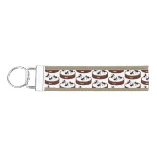 Happy ants ice skating on cookie cartoon wrist keychain