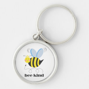 Happy bee princess with crown and slogan Bee Kind Keychain