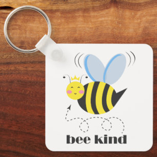 Happy bee princess with crown and slogan Bee Kind Keychain