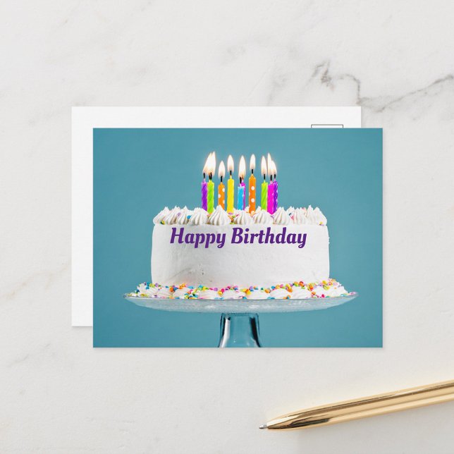 Happy Birthday Cake Postcard (A beautifully decorated birthday cake with colorful candles lit on top, set against a soft blue back)