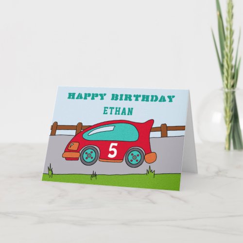 Happy Birthday Racing Car Card - A racing car Happy birthday greeting card. A costumizable and personalizable birthday card for children, specially for a boy. This card has a red racing car with an age number and is driving on a road.
You can personalize it by changing the name and the age number on the racing car.