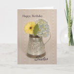 Happy Birthday Sister Card<br><div class="desc">A birthday card for Sister with a yellow Gerber daisy and blue Hydrangea in a tin pitcher and a faded background with "Happy Birthday" on the top and "Sister" in script on the bottom.</div>