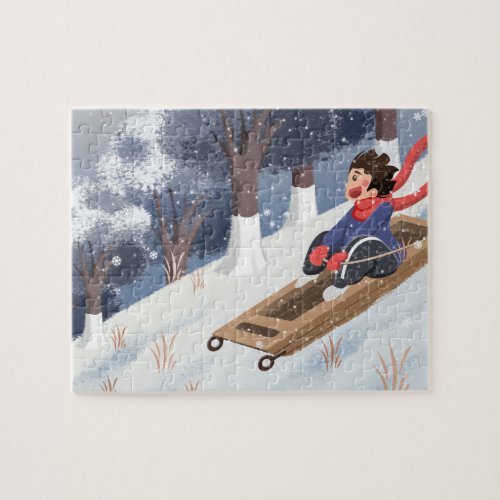 Happy Boy playing riding a sleigh on snow Jigsaw Puzzle