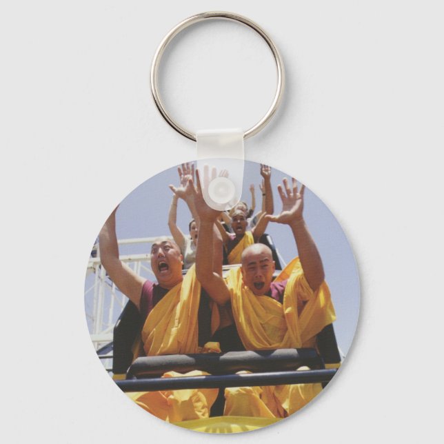 Happy buddhist monks on a roller coaster keychain (Front)