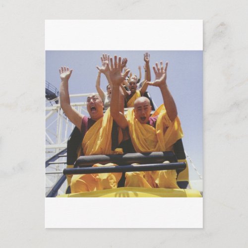 Happy buddhist monks on a roller coaster postcard