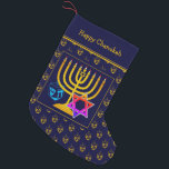 HAPPY CHANUKAH | Dreidel | Menorah | Star of David Small Christmas Stocking<br><div class="desc">Dark blue HAPPY CHANUKAH stocking with colorful Star of David, Dreidel and faux gold Menorah at the center. The placeholder greeting is CUSTOMIZABLE, so you can PERSONALIZE with your name, or add an alternative greeting. The background is a tiled pattern of gold-colored dreidels. Same design on the reverse. Ideal way...</div>