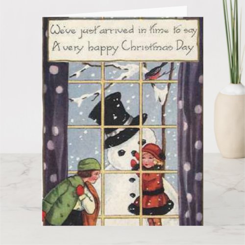 Happy Christmas day _ Children building a snowman Card