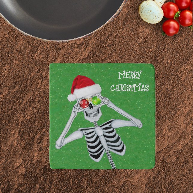 Happy Christmas Skeleton Ornament Eyes Santa Hat Trivet (Happy Christmas Skeleton ornament eyes Santa hat on green with gold flecks kitchen trivet.)