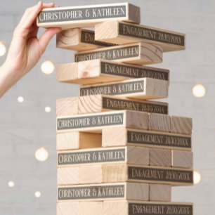 Happy Couple's Engagement Party Topple Tower