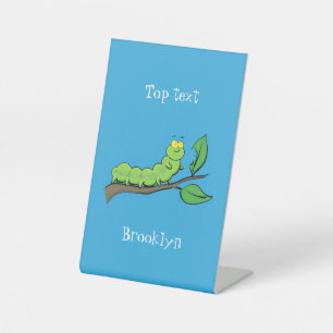 Happy cute green caterpillar cartoon illustration pedestal sign