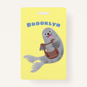 Happy cute harp seal cartoon illustration badge